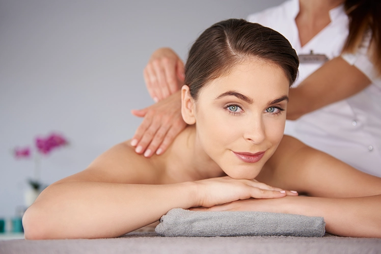 Woman Relaxing During Swedish Massage in Downey CA Spa Setting