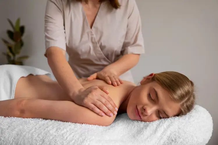 Woman Receiving Swedish Massage in Downey CA Spa Atmosphere