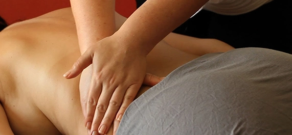 Hands Massaging Back During Deep Tissue Massage Downey CA