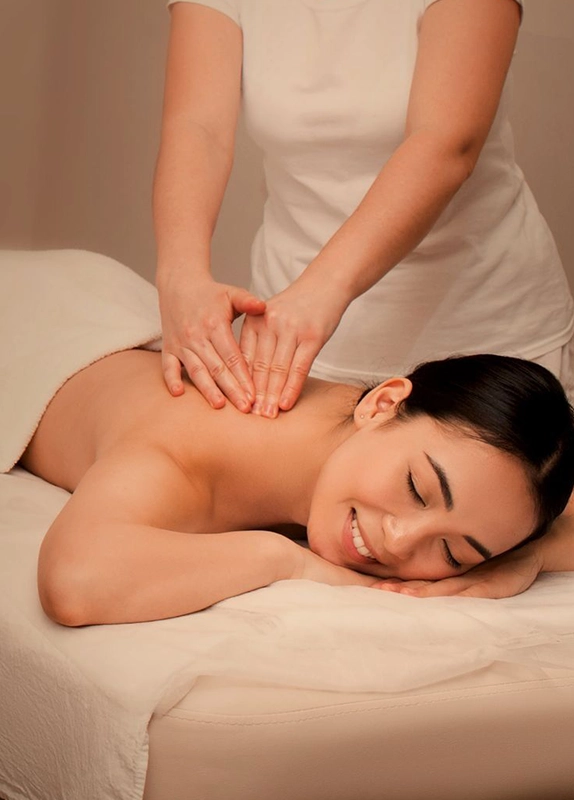 Woman Receiving Relaxing Swedish Massage at Spa in Downey CA