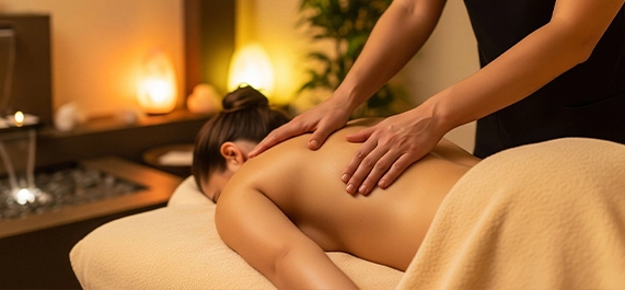 Therapist Performing Swedish Massage Downey CA on Relaxed Client